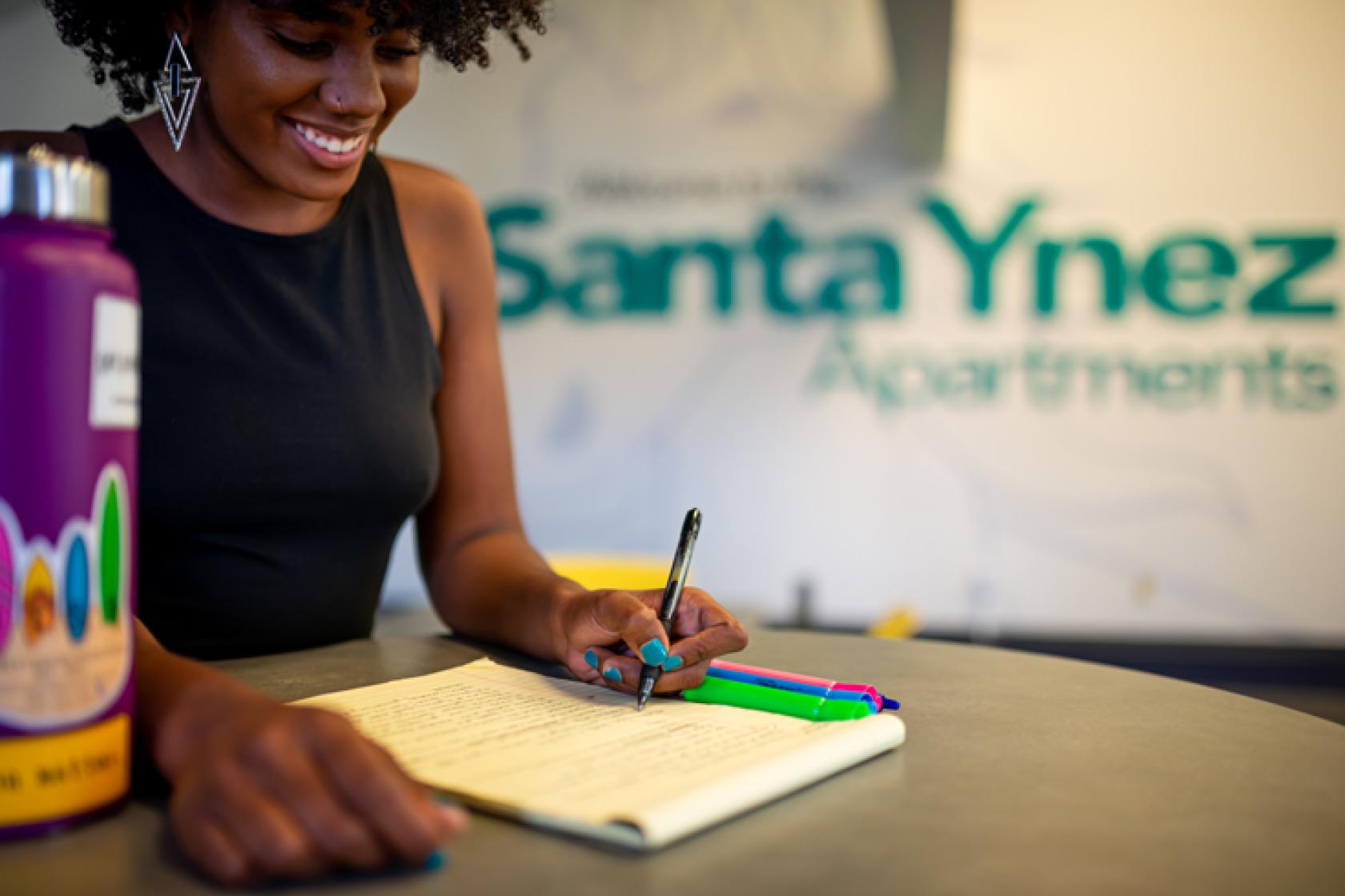 student studying in a Santa Ynez common area