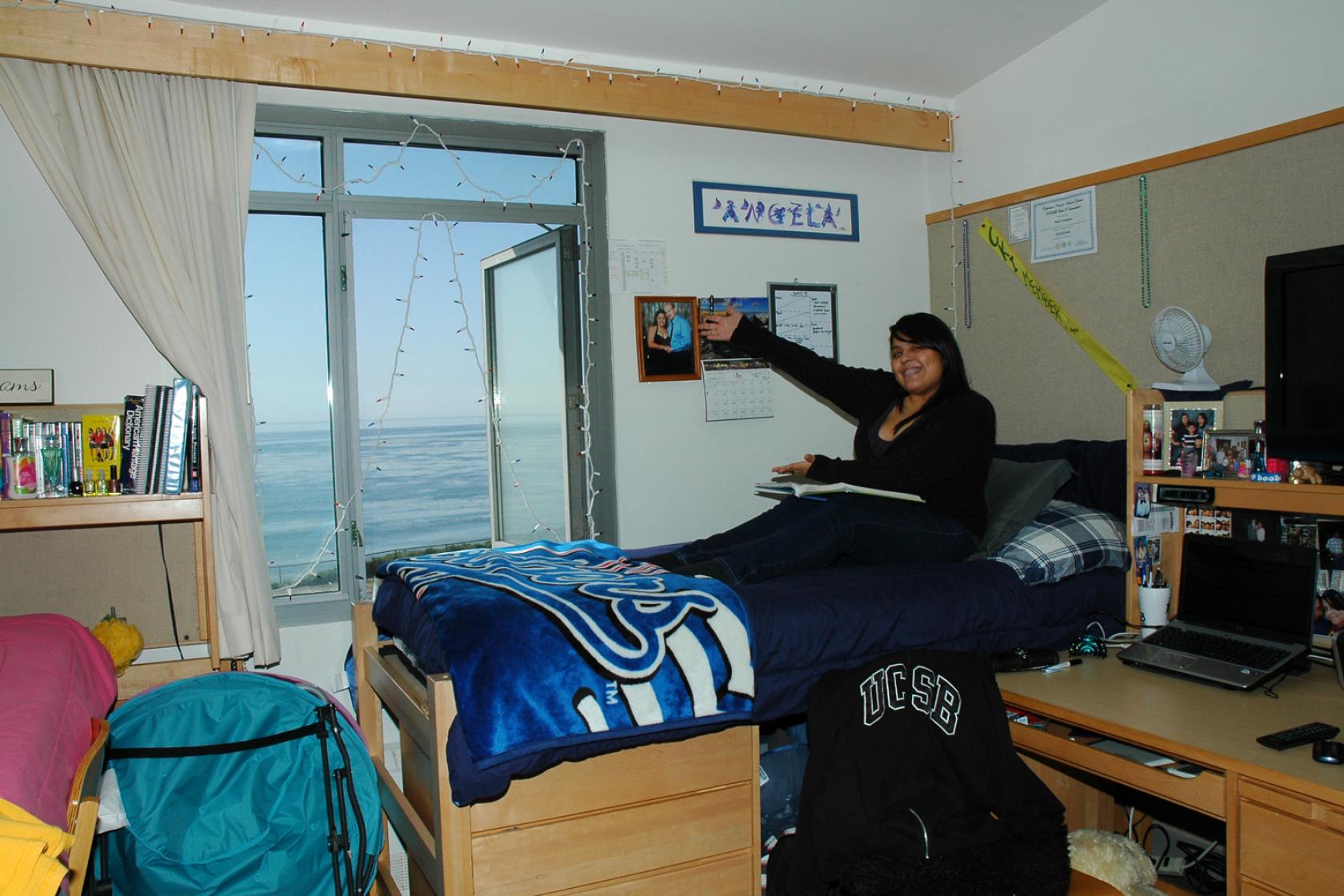 student inside a Manzanita Village room