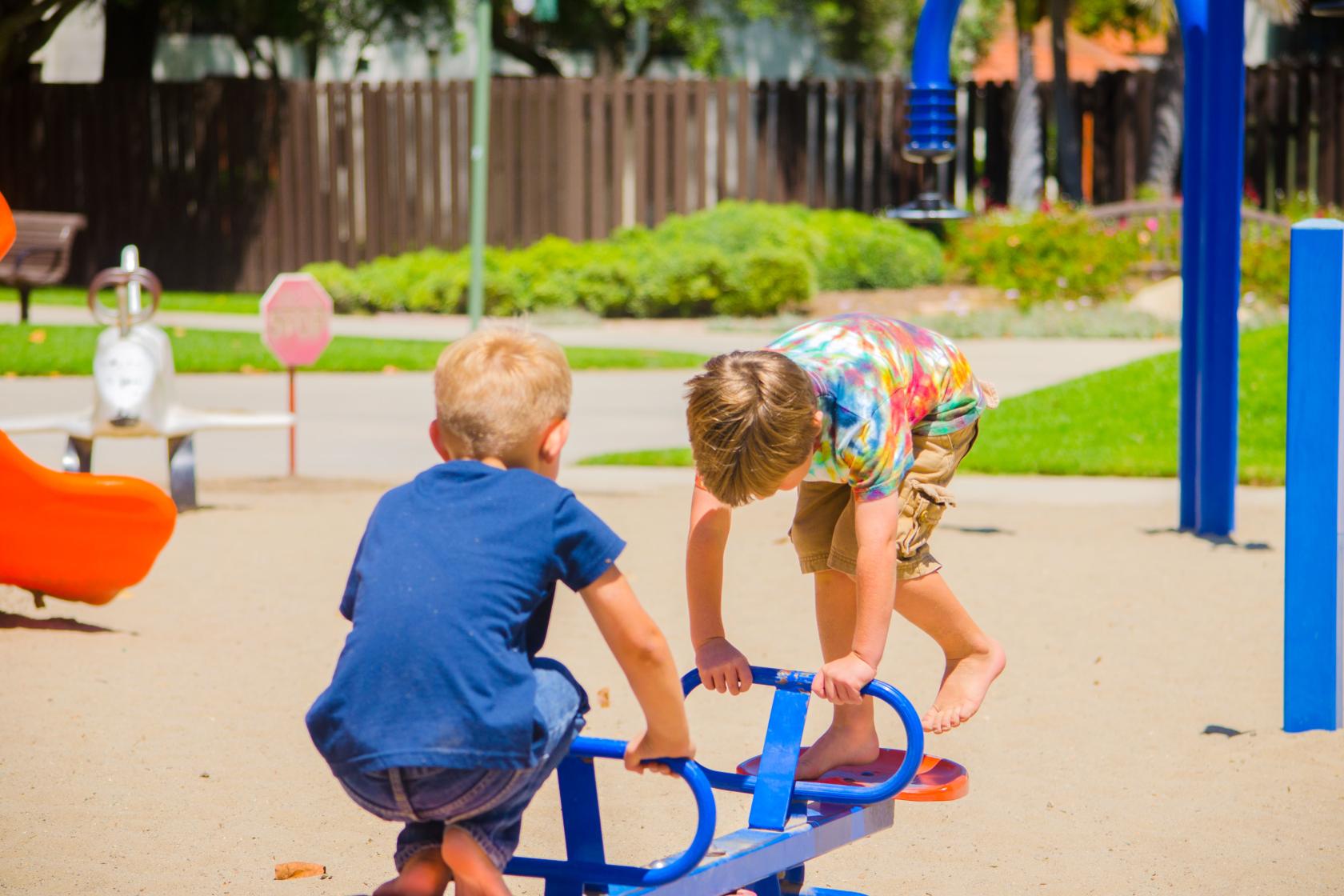 children playing outside on the playground