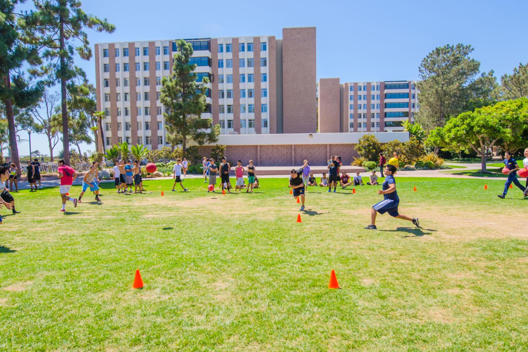 students playing dodgeball on San Miguel lawn