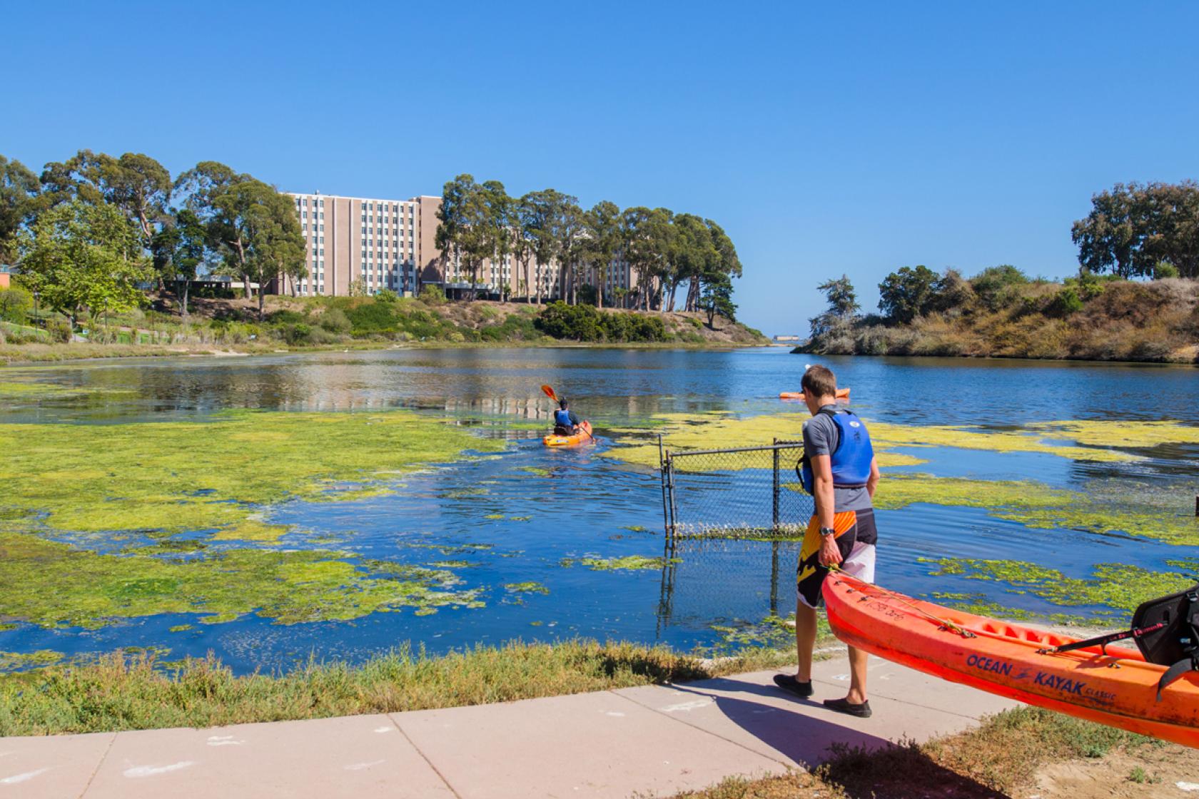 students kayaking in the lagoon