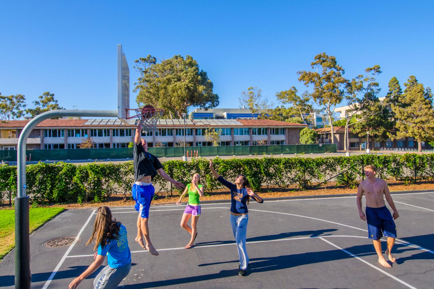 students playing basketball 