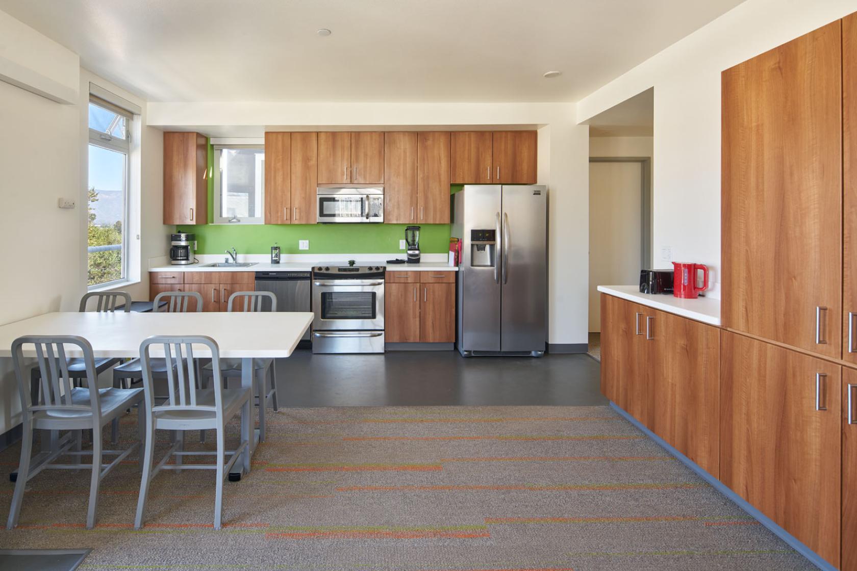 interior of kitchen and living room of a San Joaquin Villages apartment